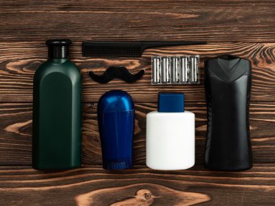 Barber shop tools on old wooden background
